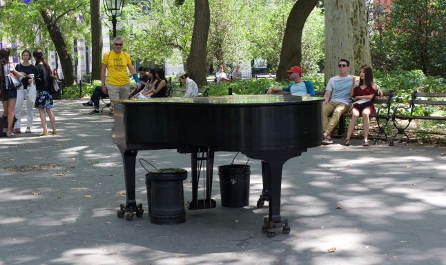 Someone managed to bring this grand piano into the middle of the park. Some days there is famously another grand piano that is played under the iconic archway. 